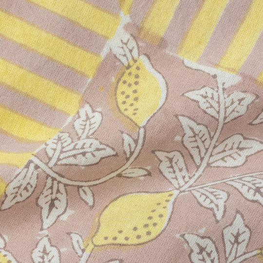 Close-up of hand block-printed lemon pattern on cotton napkin