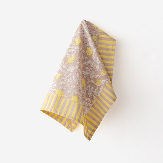 Dusty rose cotton napkin, hand block-printed with lemon motif and striped border
